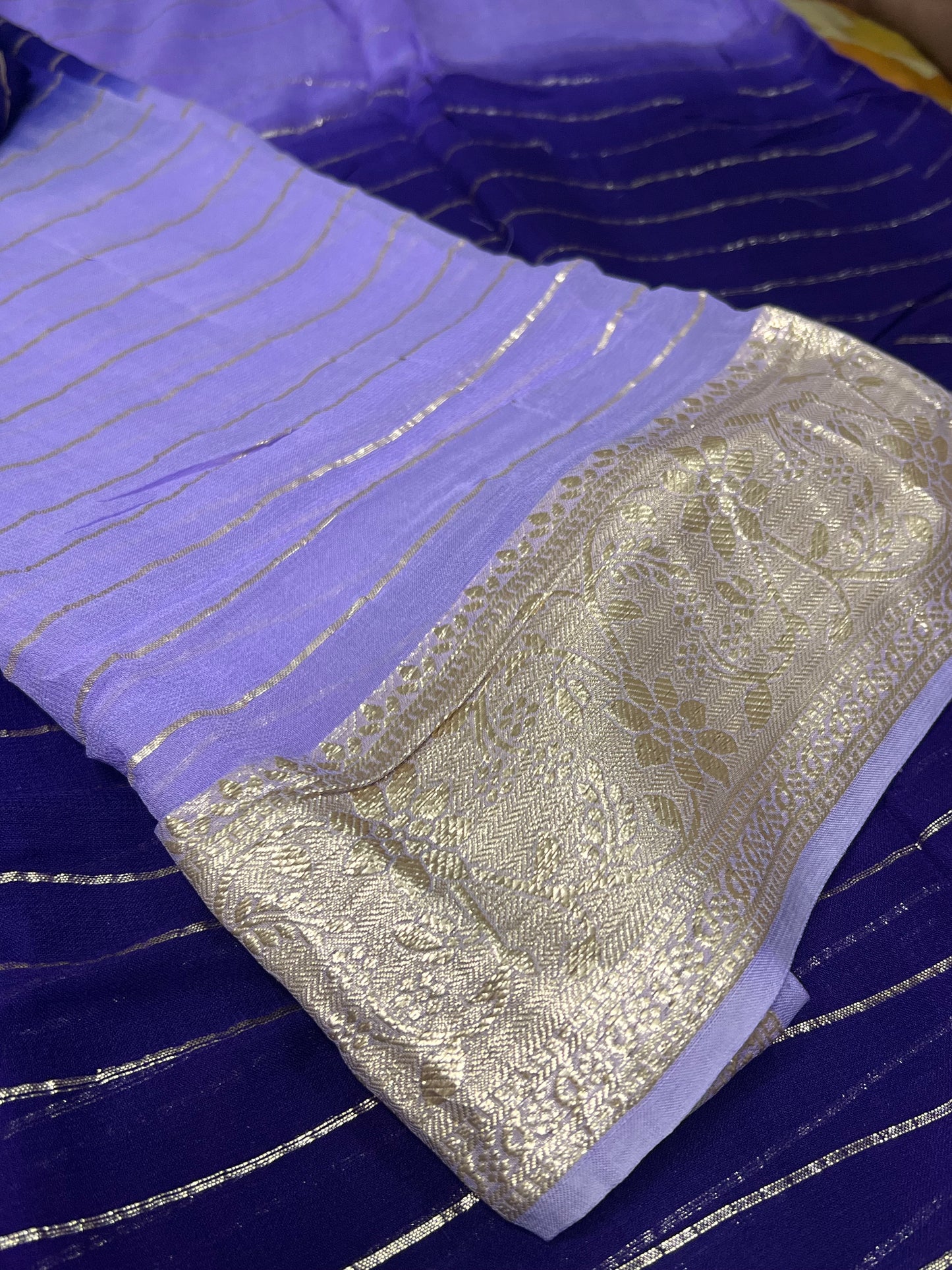 Viscose Georgette Saree with Heavy weaving Border and Jari Lining All Over the Saree Paired with Blouse Piece same as Saree