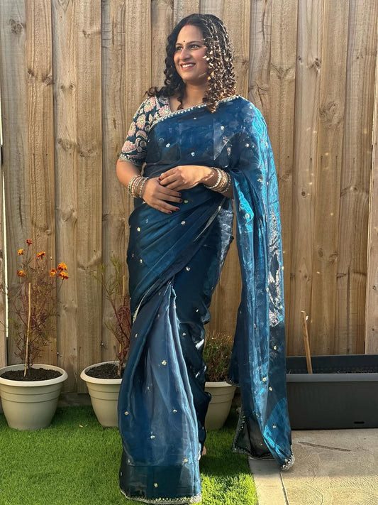 Jimi Chu Organza Saree with heavy lace work & all over sequence work paired with heavy embroidered work blouse piece