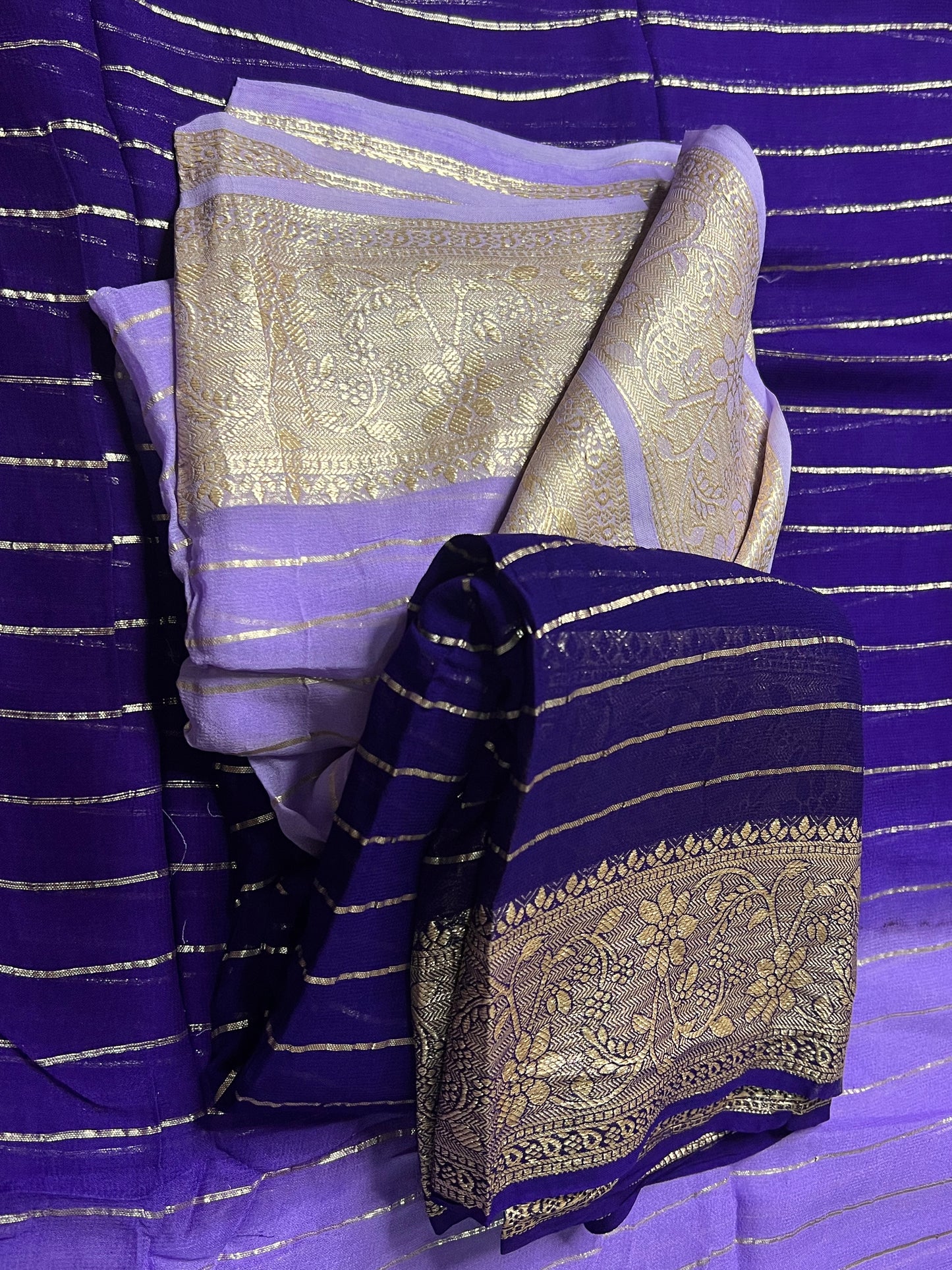 Viscose Georgette Saree with Heavy weaving Border and Jari Lining All Over the Saree Paired with Blouse Piece same as Saree