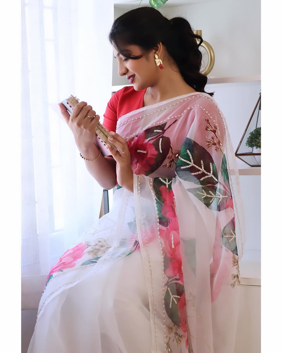 Pearls and Petals Elegant Organza Saree Beautiful print with Heavy Handcrafted Khatli and Pearl work all over saree paired with Plain Cherry Red Color Blouse Piece