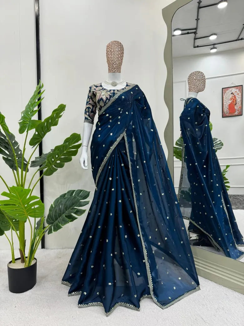 Jimi Chu Organza Saree with heavy lace work & all over sequence work paired with heavy embroidered work blouse piece