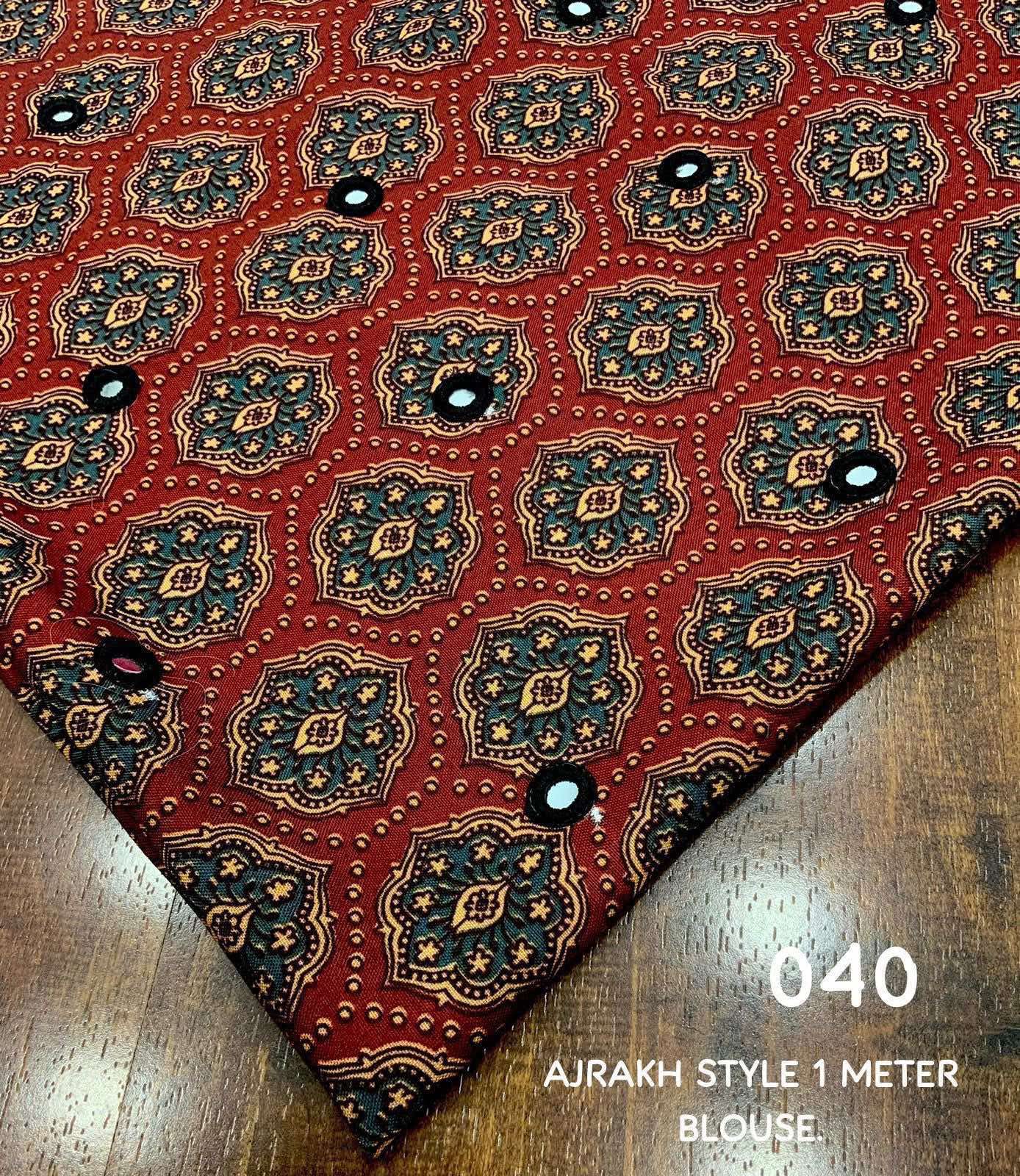 White LINEN Saree, featuring beautiful zari woven leaf design...pallu is adorned with cotton tassels...blouse is made of linen fabric with ajrakh style prints and foil mirror work