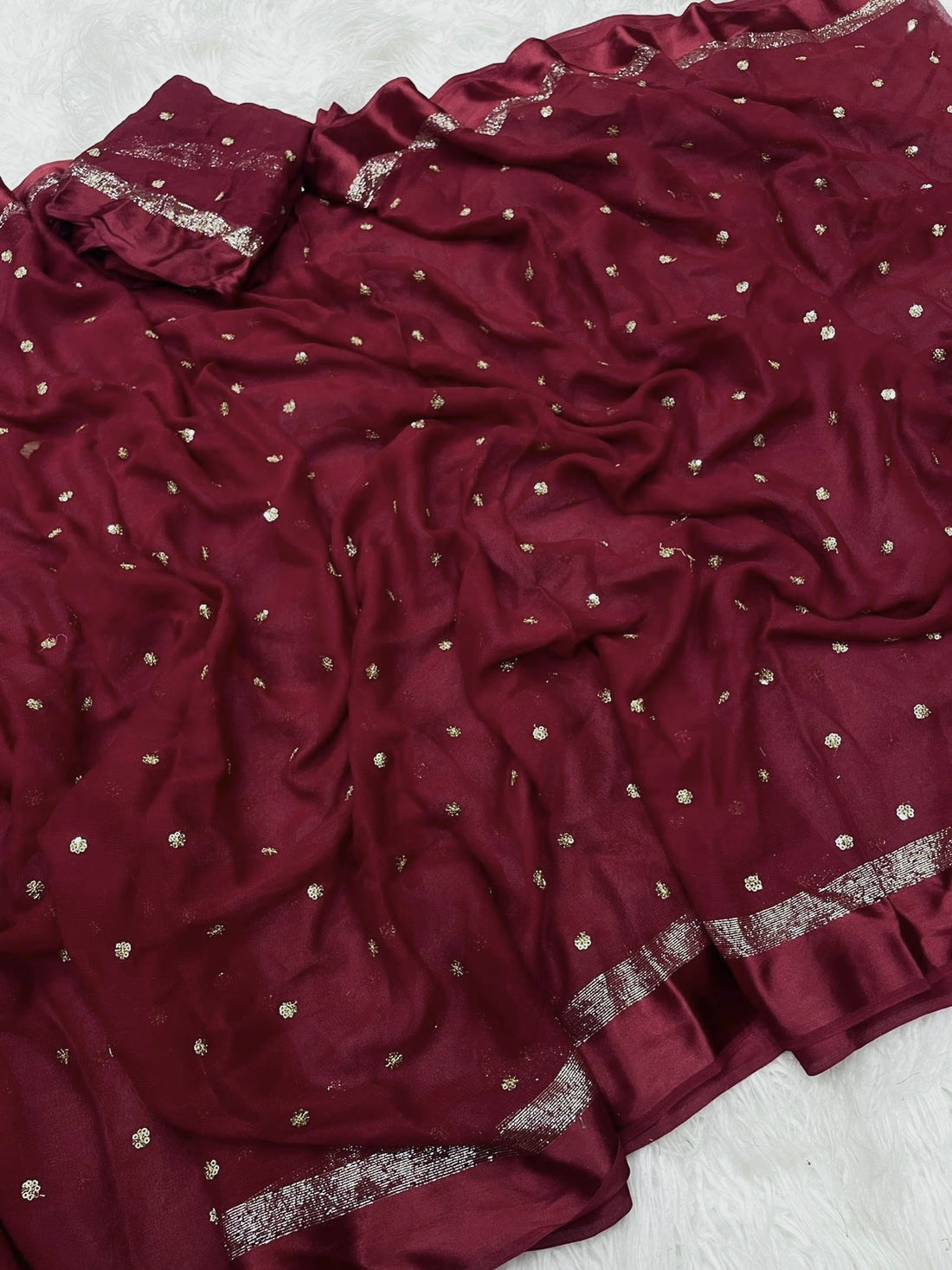 DEEP MAROON Viscose Georgette Saree with Jari Weaving Satin Border and Sequins Work allover the body