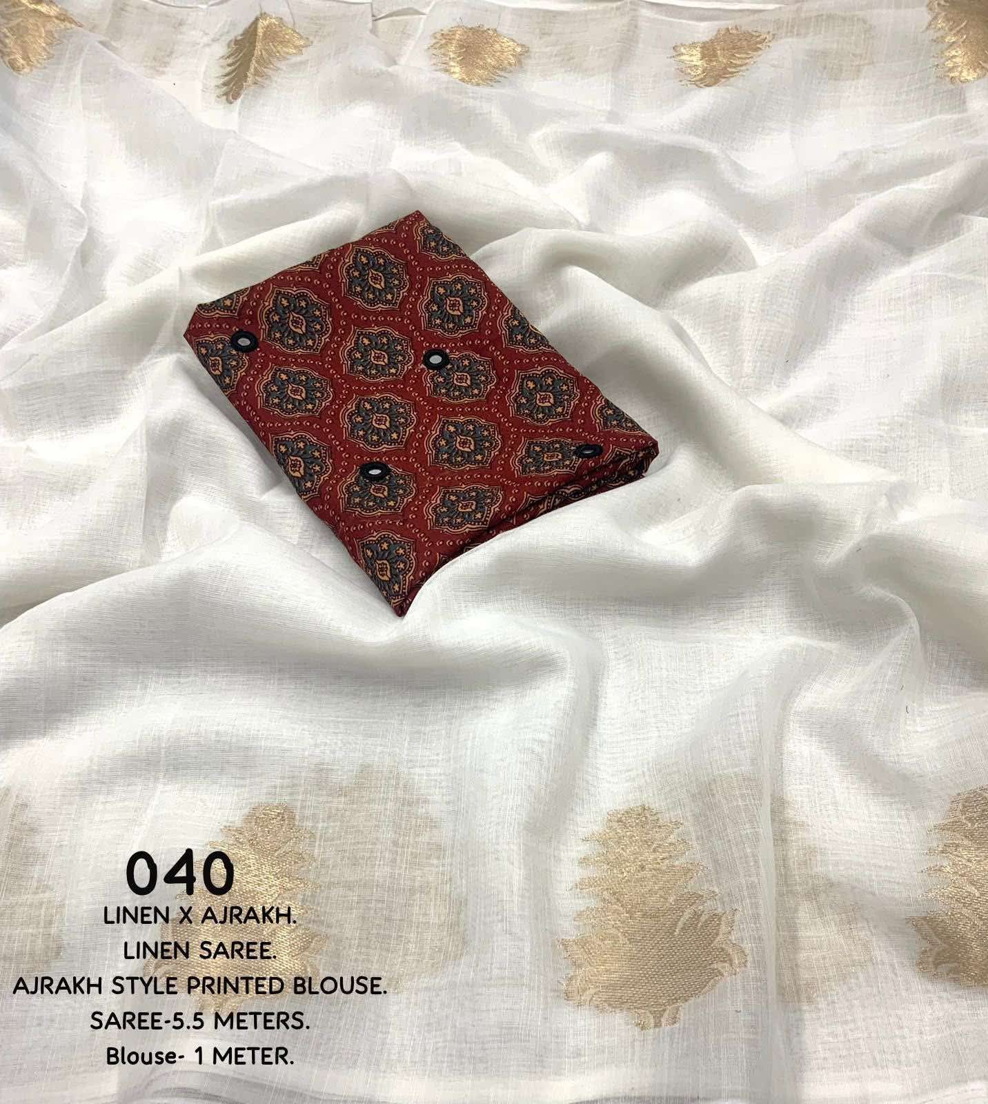 White LINEN Saree, featuring beautiful zari woven leaf design...pallu is adorned with cotton tassels...blouse is made of linen fabric with ajrakh style prints and foil mirror work