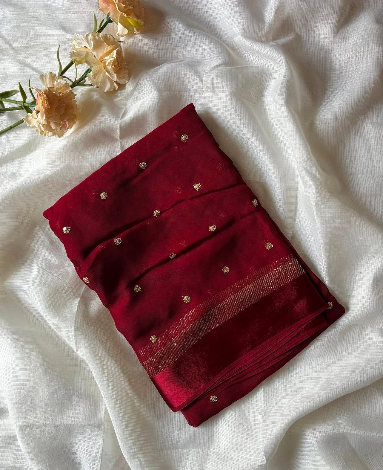 DEEP MAROON Viscose Georgette Saree with Jari Weaving Satin Border and Sequins Work allover the body