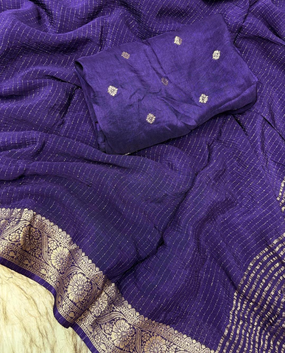 Deep Purple Chinon Silk Saree with Jari Lining Allover The Saree with Heavy Weaving Border and Pallu paired with Weaving Chinon Silk Blouse Piece