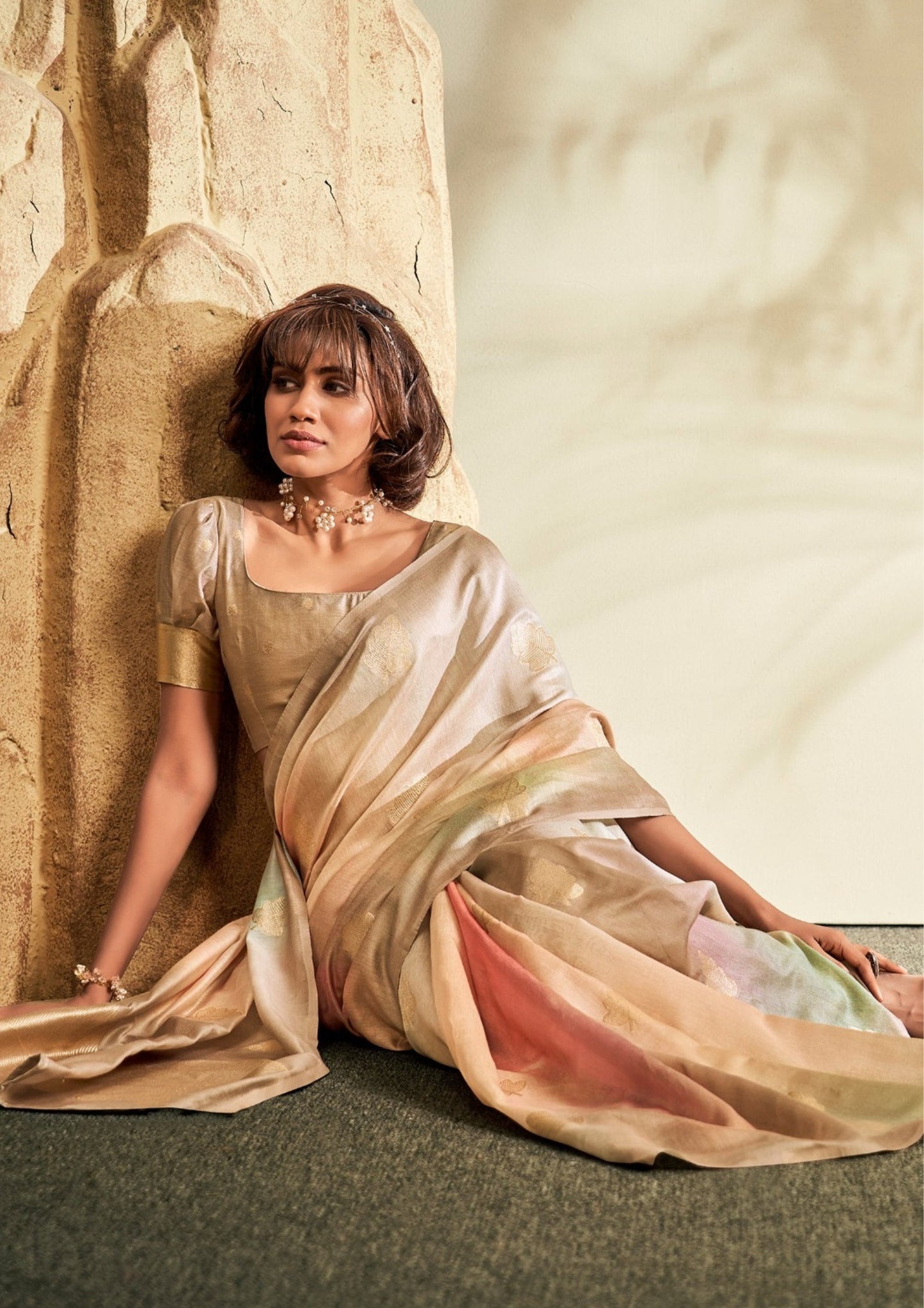 CHAMPAGNE BEIGE Color base KHADI SILK Saree flows gracefully with warm gold, pastel blush pink, muted sage green