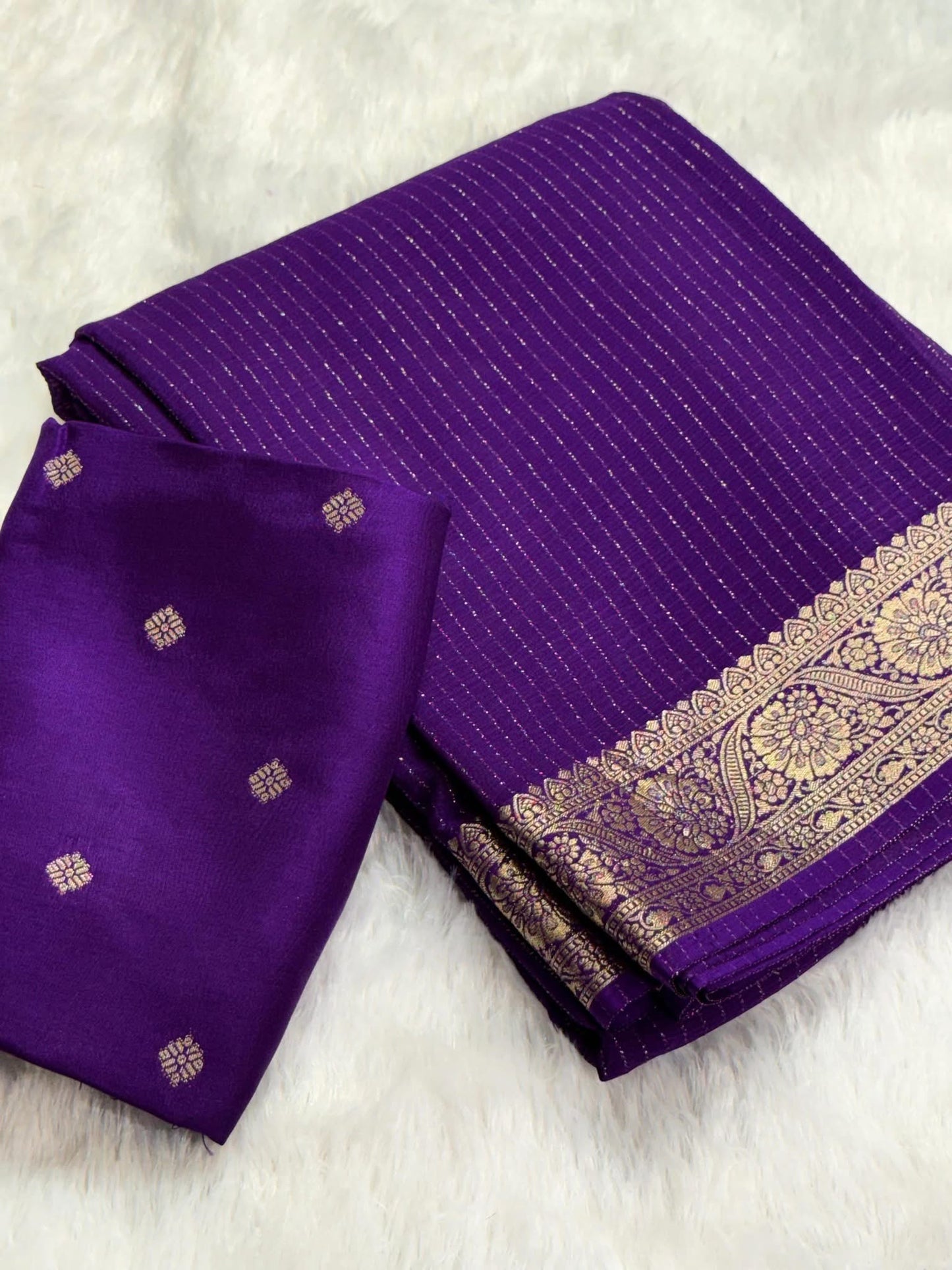 Deep Purple Chinon Silk Saree with Jari Lining Allover The Saree with Heavy Weaving Border and Pallu paired with Weaving Chinon Silk Blouse Piece