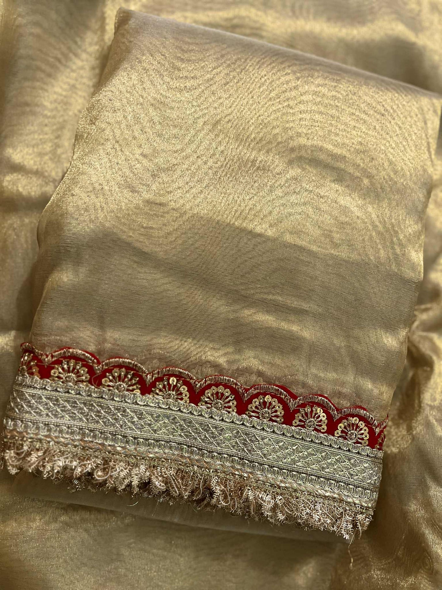 Golden Tissue Saree with Heavy Lace Border and Pallu paired with Velvet Blouse Piece Heavy Lace