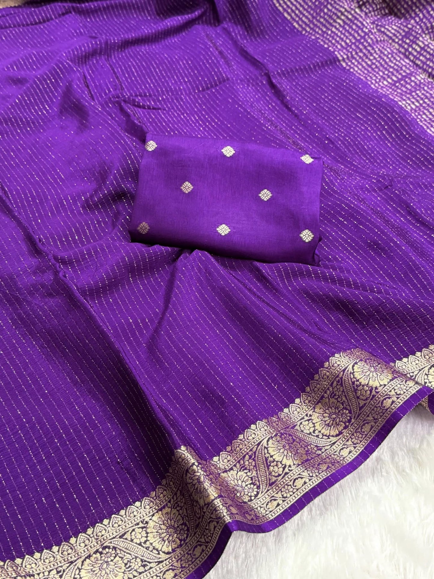 Deep Purple Chinon Silk Saree with Jari Lining Allover The Saree with Heavy Weaving Border and Pallu paired with Weaving Chinon Silk Blouse Piece