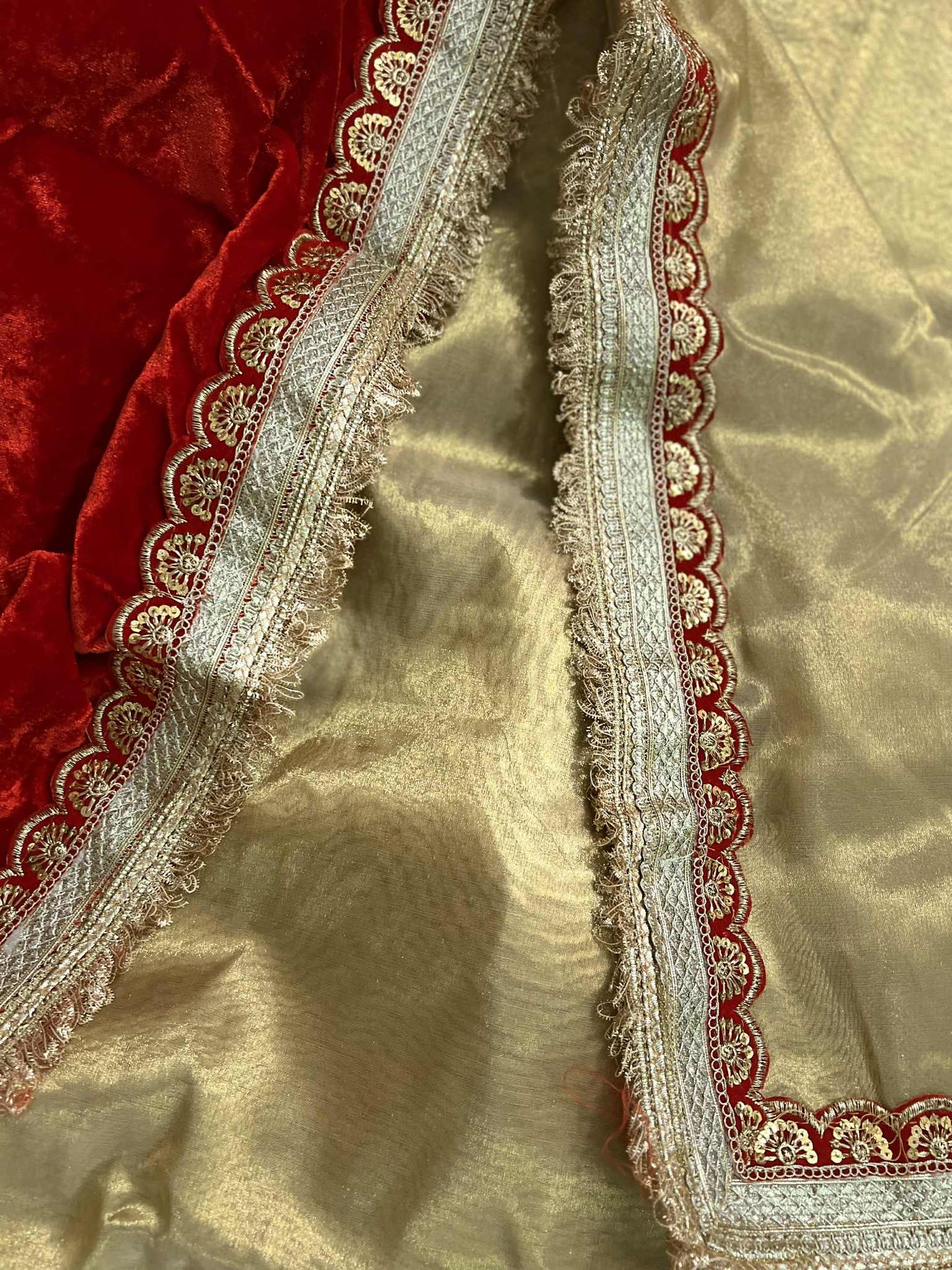 Golden Tissue Saree with Heavy Lace Border and Pallu paired with Velvet Blouse Piece Heavy Lace