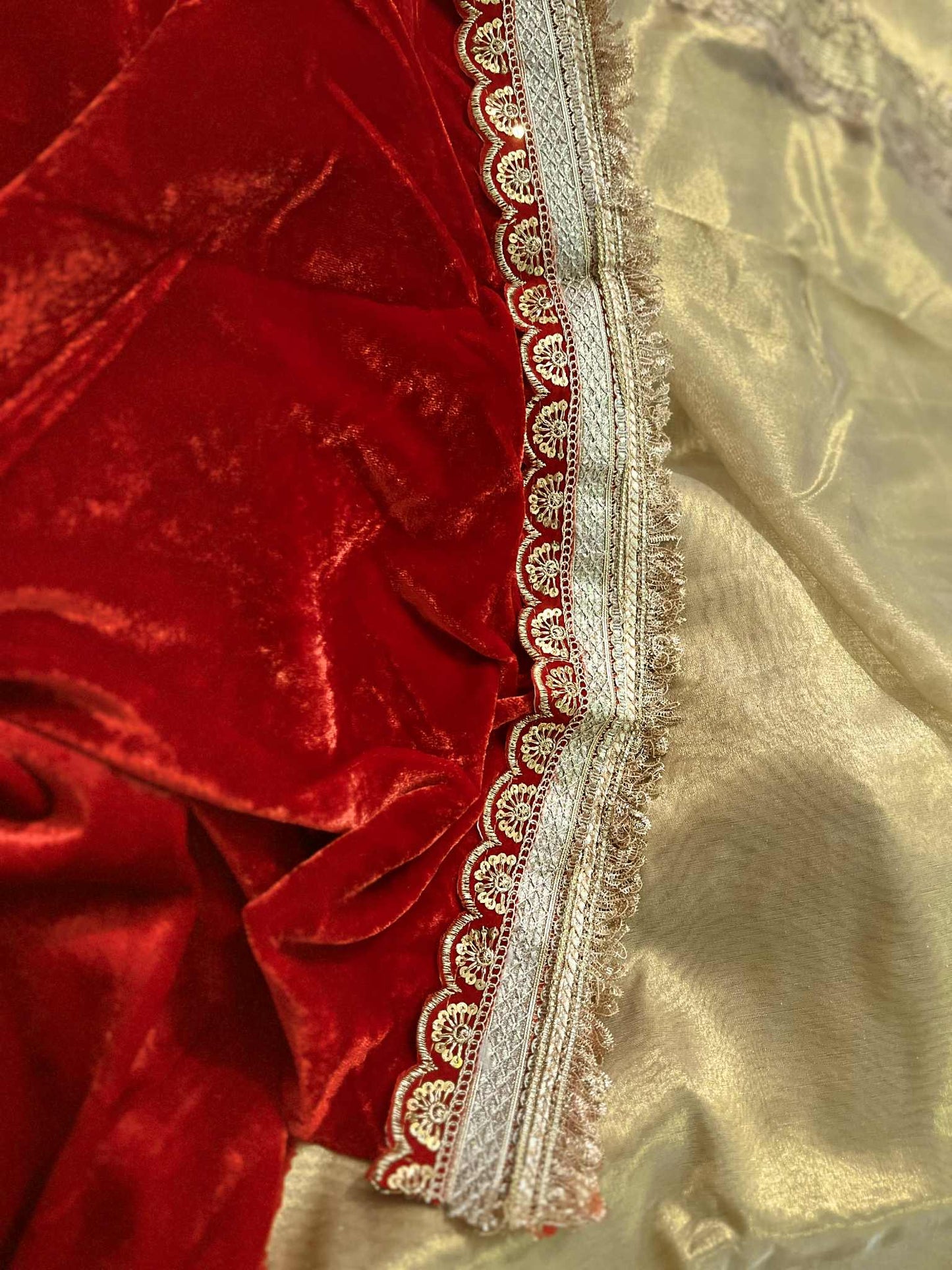 Golden Tissue Saree with Heavy Lace Border and Pallu paired with Velvet Blouse Piece Heavy Lace