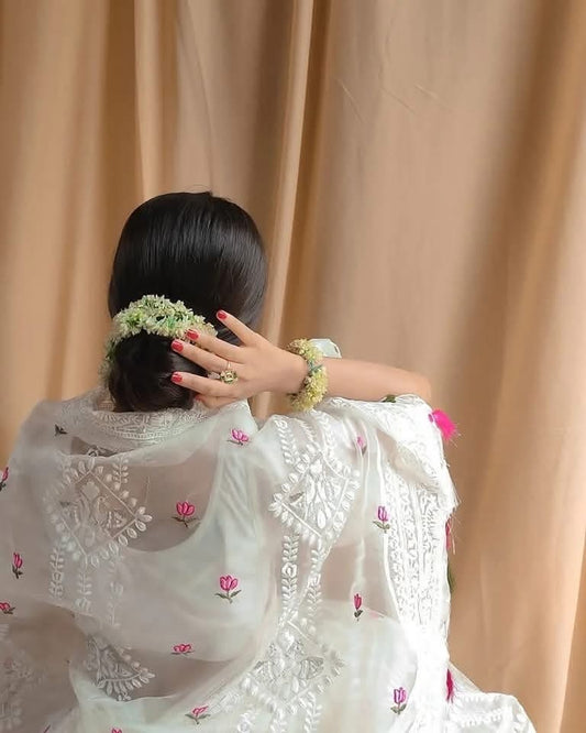 Organza saree with all over embroidery work & with colorful tassels on the pallu