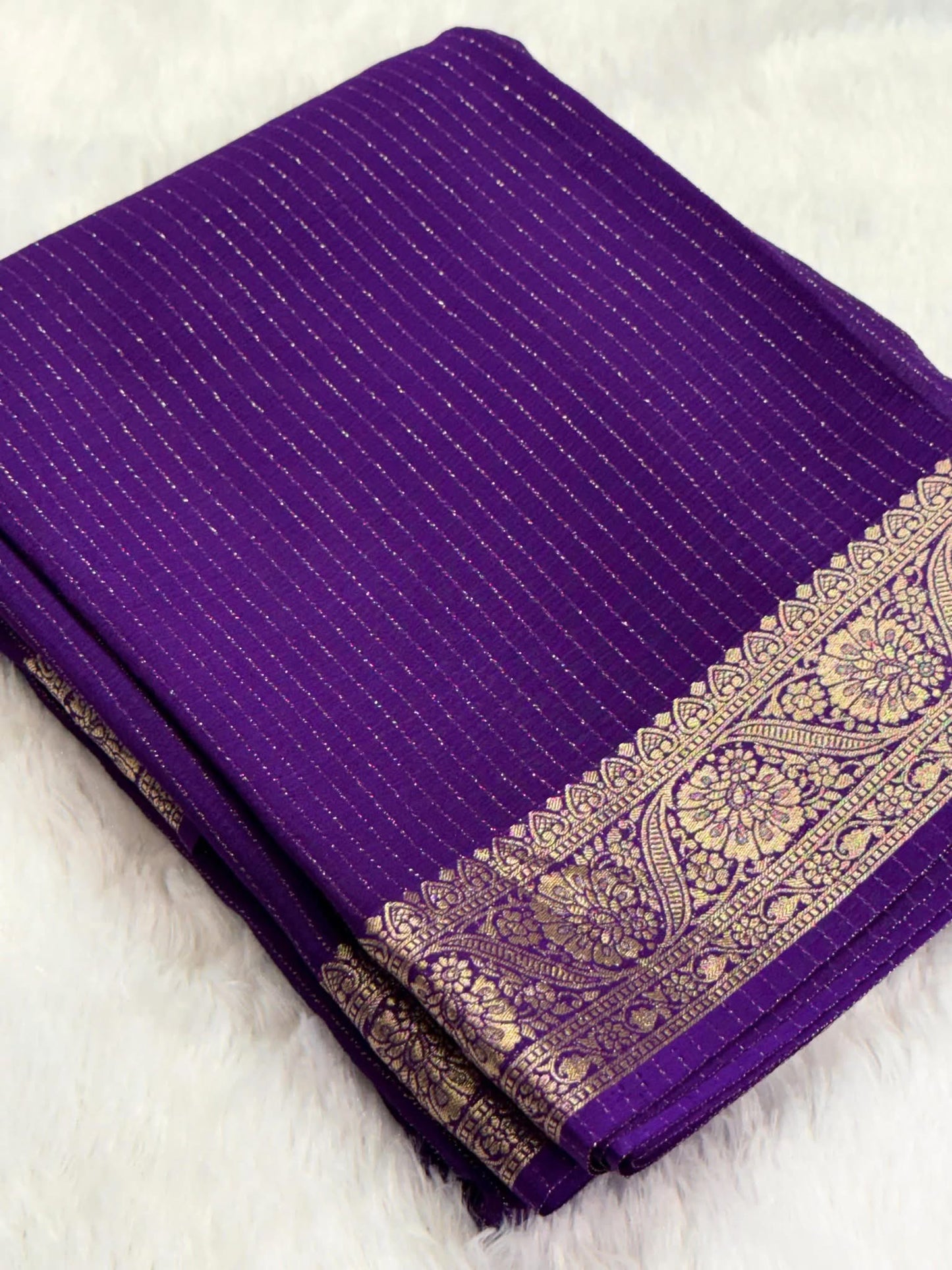 Deep Purple Chinon Silk Saree with Jari Lining Allover The Saree with Heavy Weaving Border and Pallu paired with Weaving Chinon Silk Blouse Piece