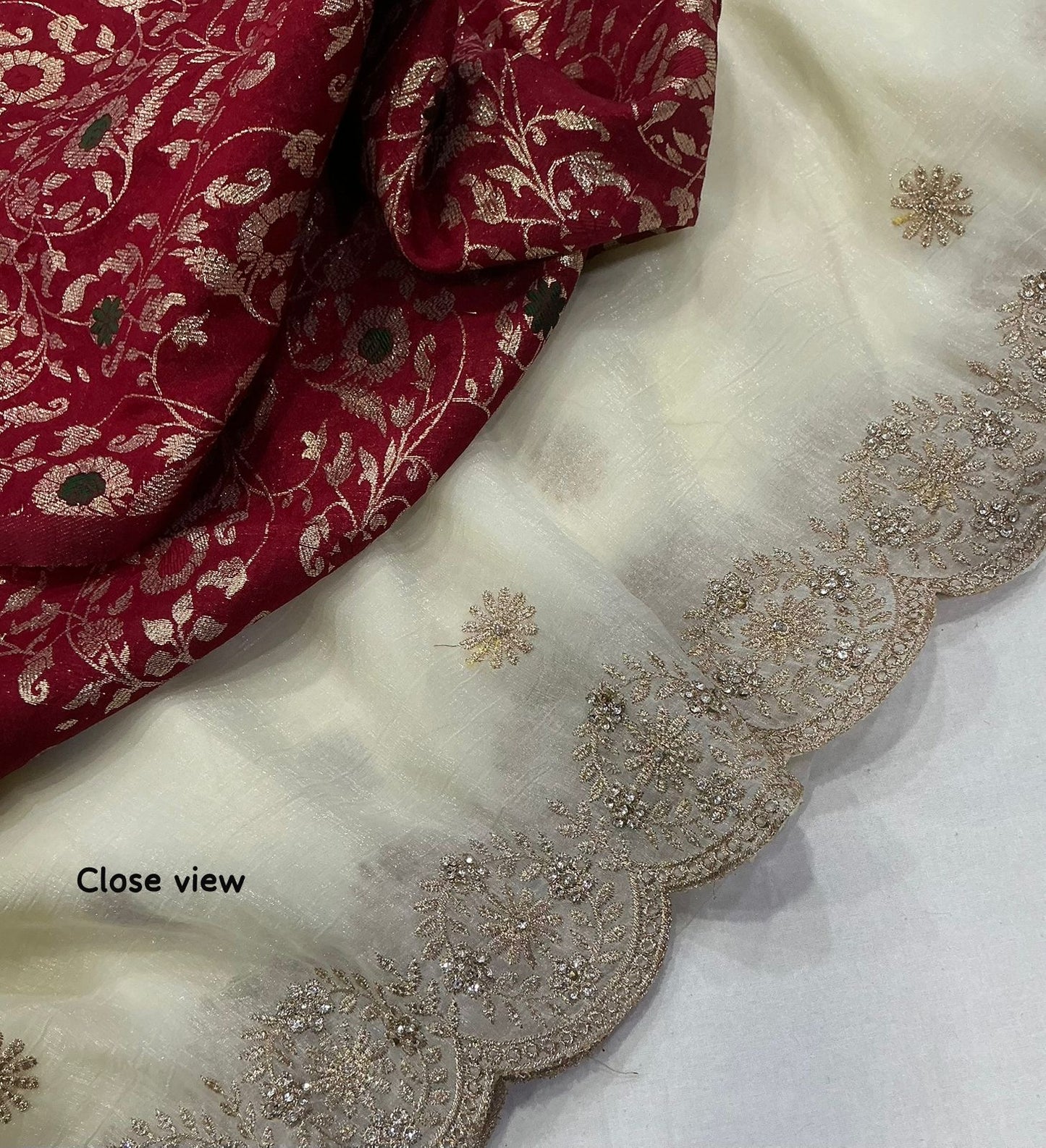 IVORY WHITE Color soft crunchy crush georgette saree with zari embroidery and stone work