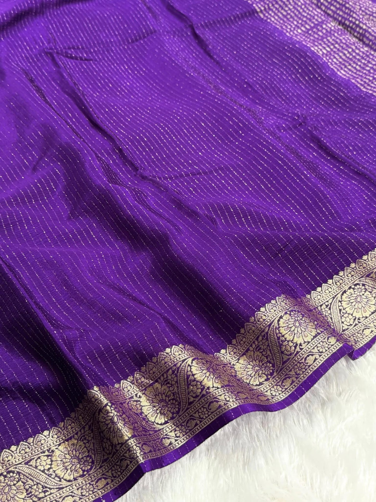 Deep Purple Chinon Silk Saree with Jari Lining Allover The Saree with Heavy Weaving Border and Pallu paired with Weaving Chinon Silk Blouse Piece