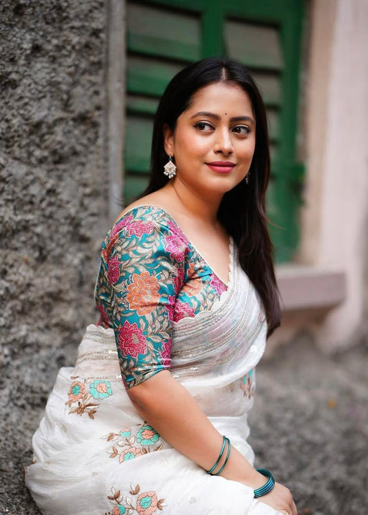 Off White Vanila color Paper Silk Saree with Beautiful combination tone to tone thread work with multicolour floral embroidery