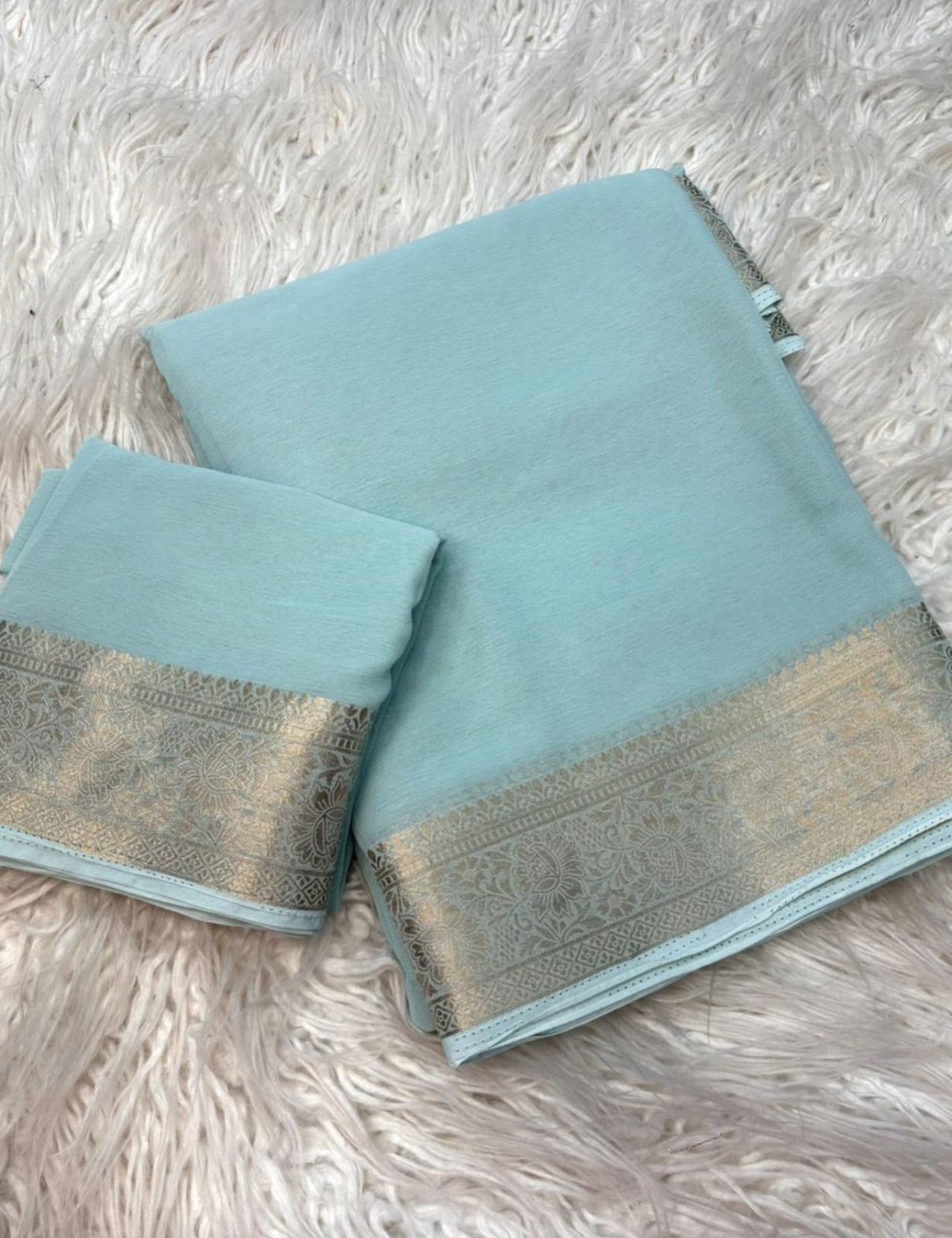 PASTEL BLUE Chiffon Saree— sheer grace with a rich golden border, timeless and powerful