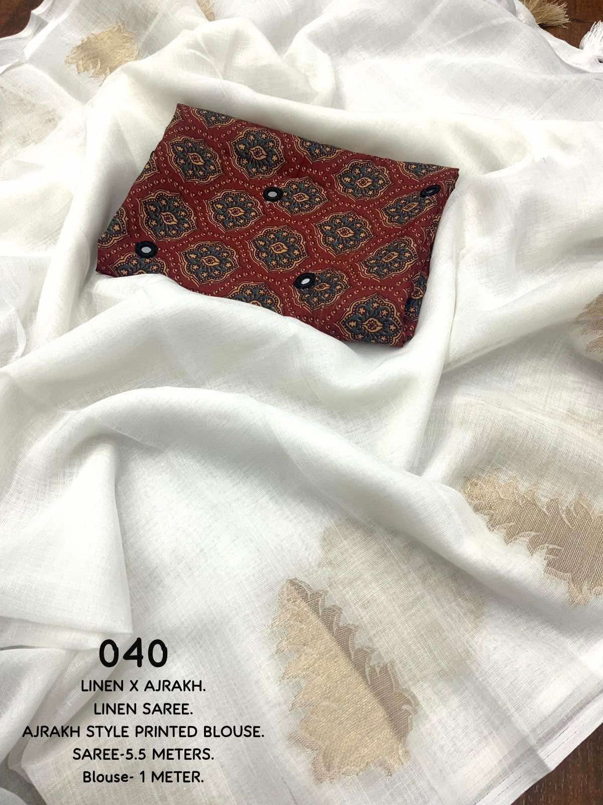 White LINEN Saree, featuring beautiful zari woven leaf design...pallu is adorned with cotton tassels...blouse is made of linen fabric with ajrakh style prints and foil mirror work