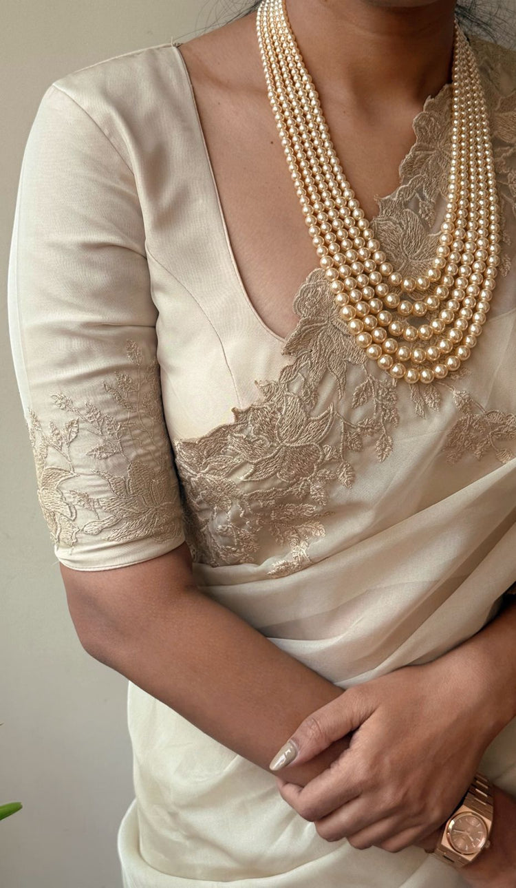 BEIGE Color Tabby organza Saree featuring intricate embroidery work