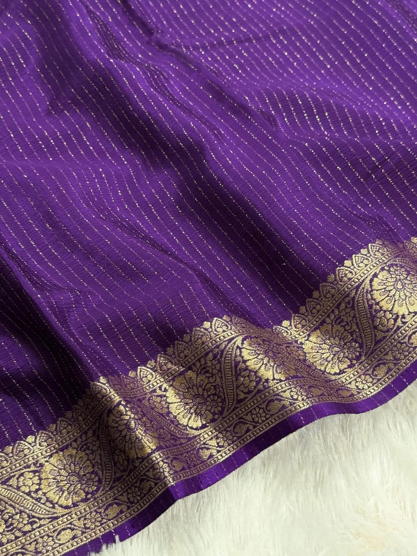 Deep Purple Chinon Silk Saree with Jari Lining Allover The Saree with Heavy Weaving Border and Pallu paired with Weaving Chinon Silk Blouse Piece