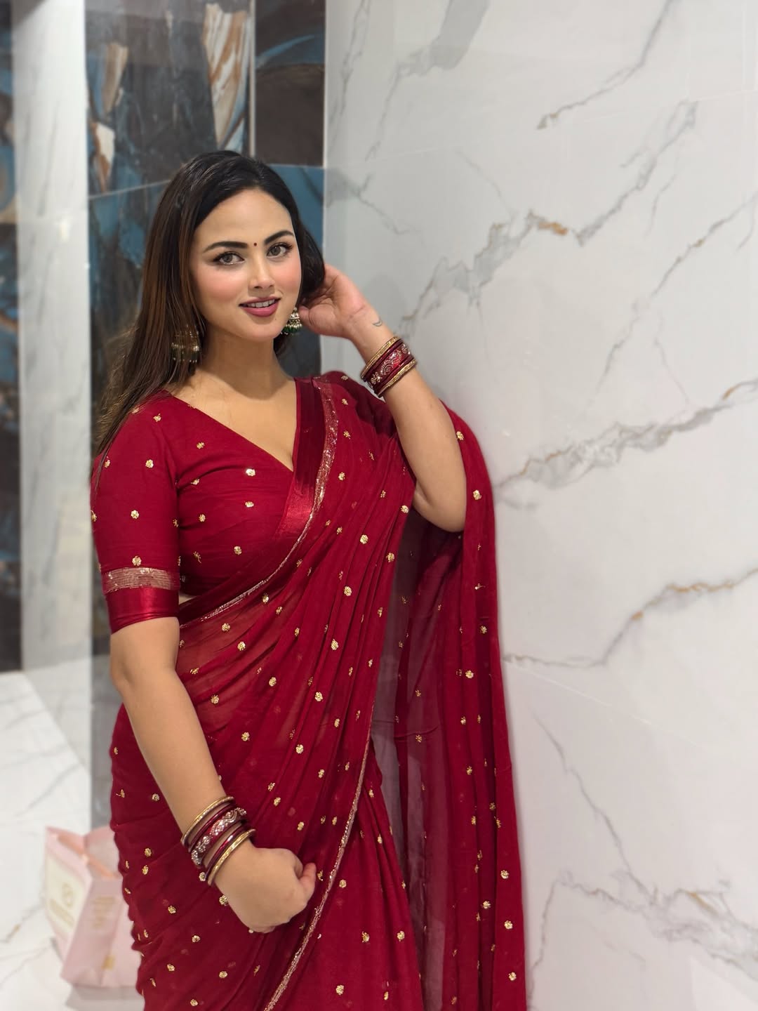 DEEP MAROON Viscose Georgette Saree with Jari Weaving Satin Border and Sequins Work allover the body