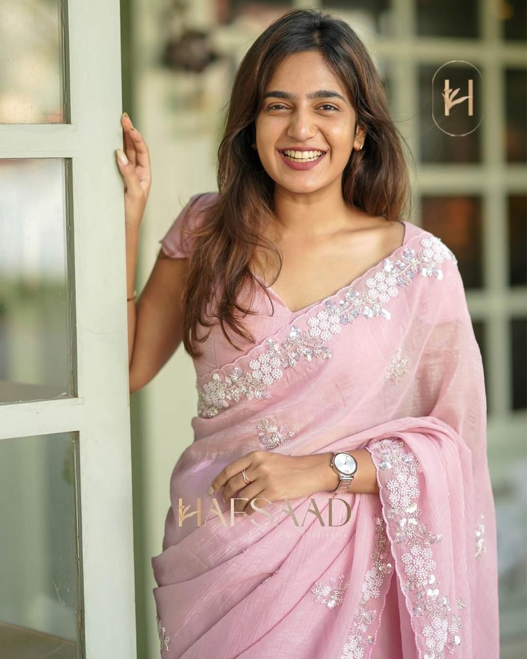 Soft Pink canvas kissed with twinkling charm Chiffon Silk Saree with Heavy Handwork with Beads work, Khatli Work, Sequins Work and Aacro Border
