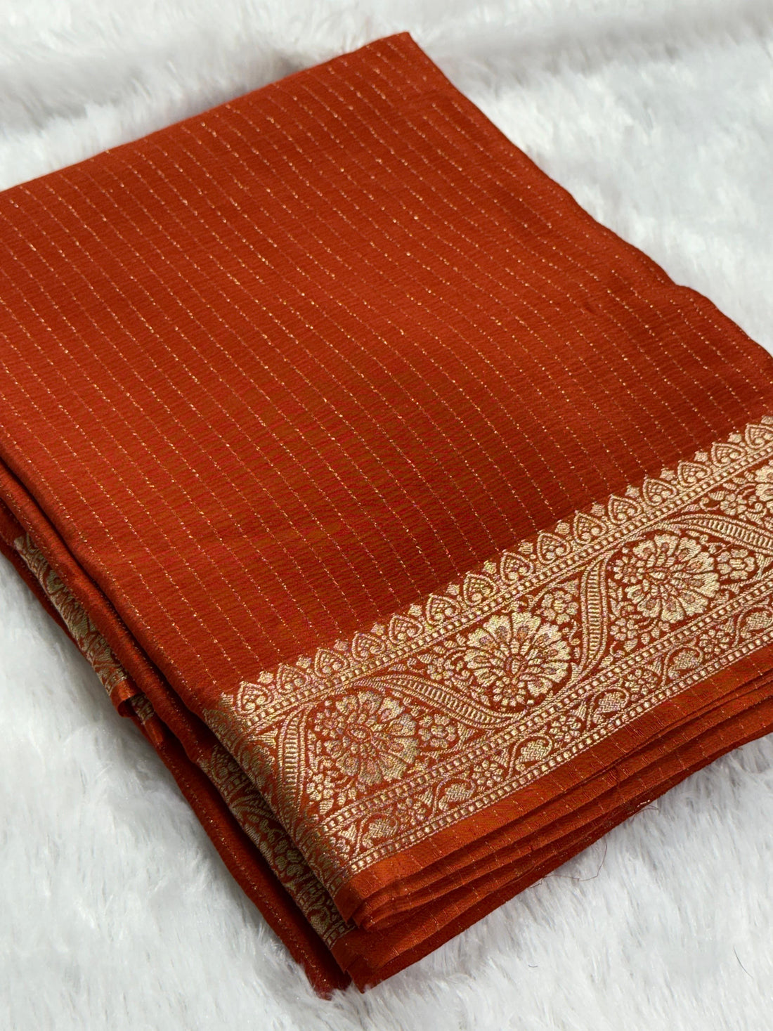 DEEP RUST ORANGE Color Chinon Silk Saree with Jari Lining Allover The Saree with Heavy Weaving Border and Pallu paired with Weaving Chinon Silk Blouse Piece