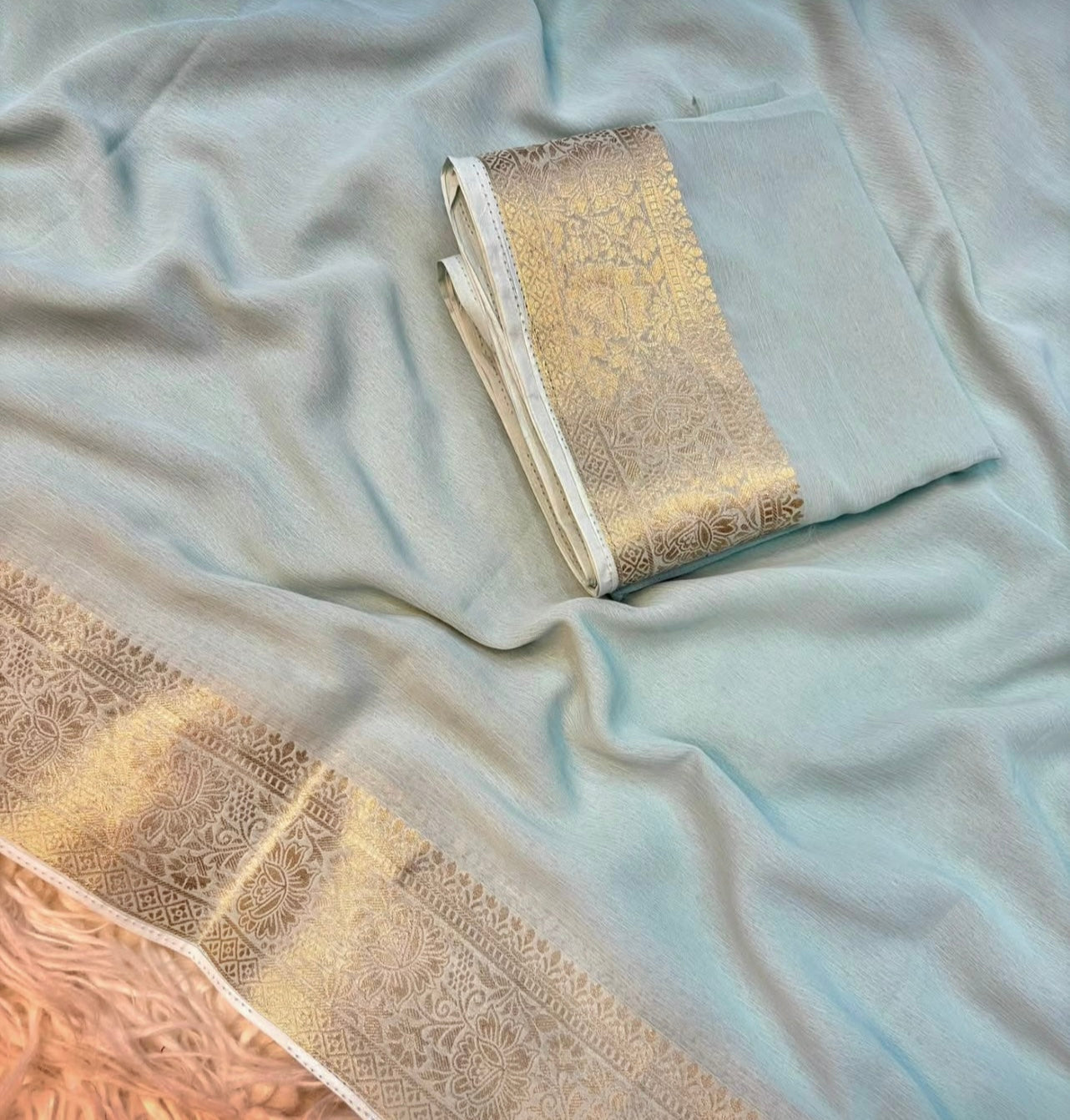 PASTEL BLUE Chiffon Saree— sheer grace with a rich golden border, timeless and powerful