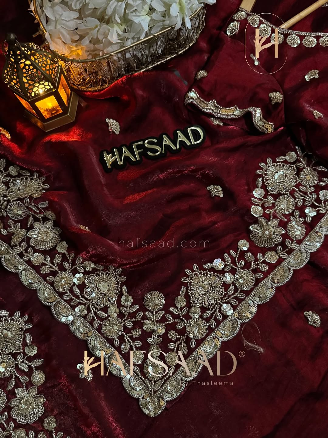 Deep Maroon Color Stardust Satin Saree with Faded Gold Color handwork