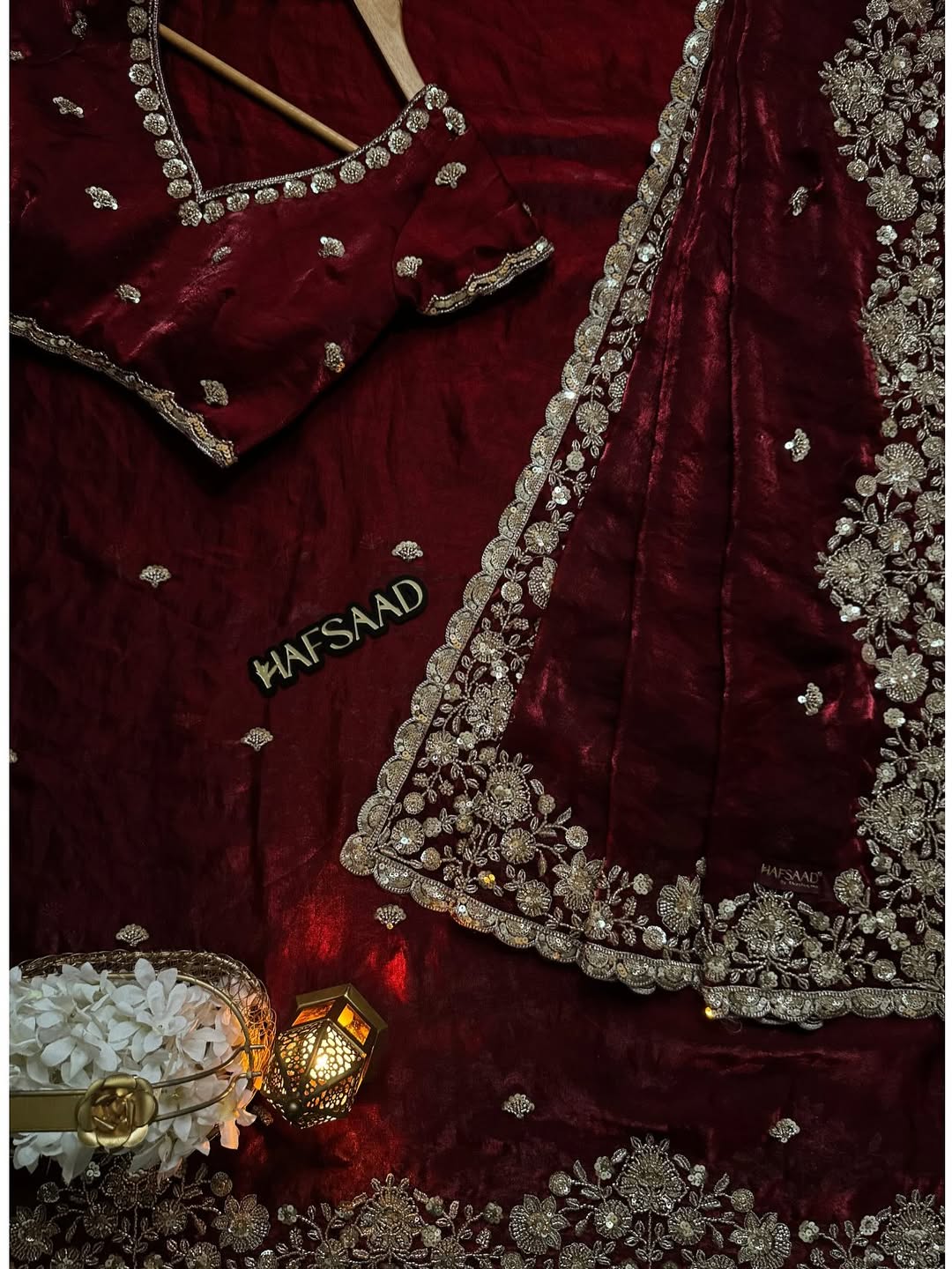 Deep Maroon Color Stardust Satin Saree with Faded Gold Color handwork