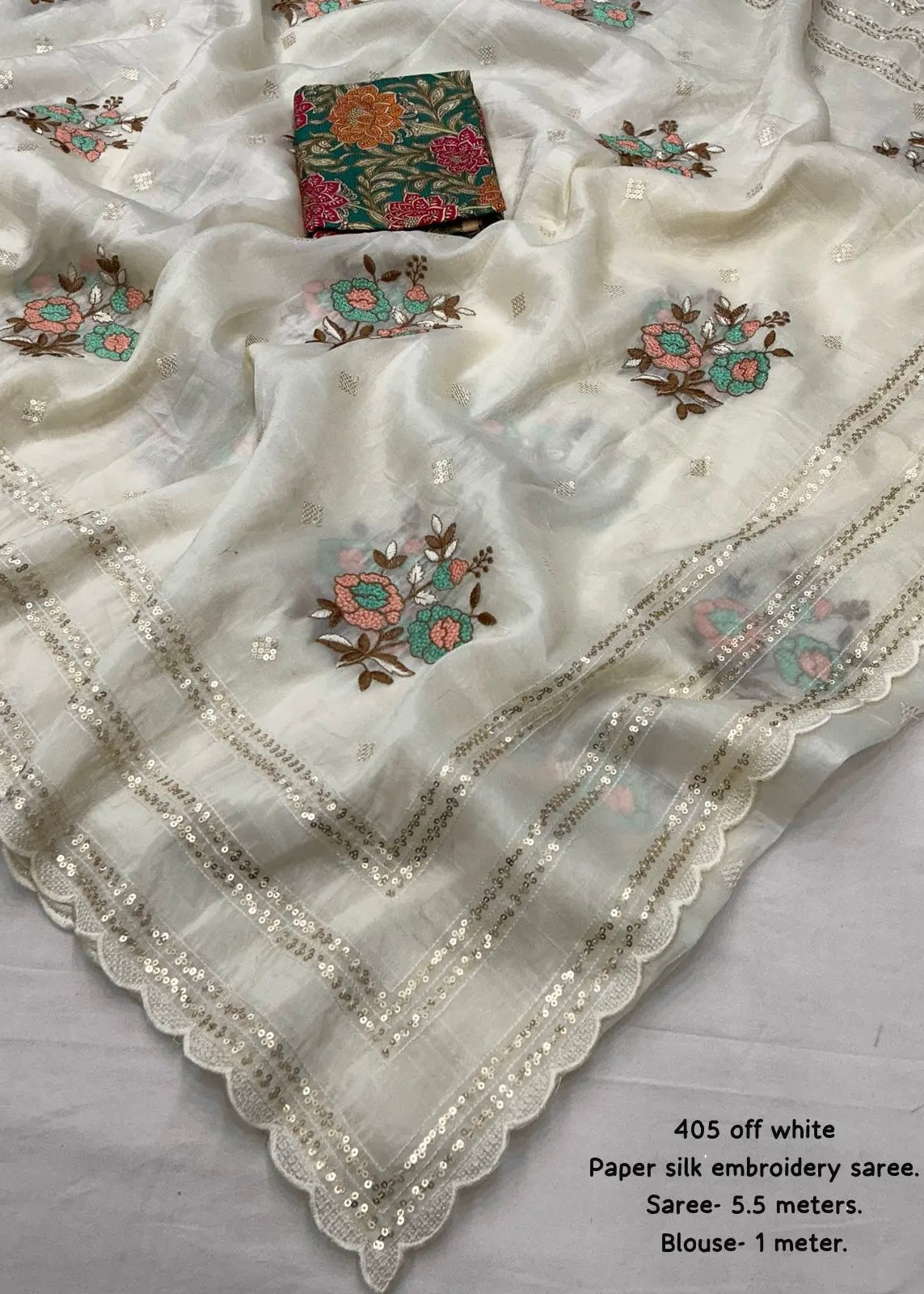 Off White Vanila color Paper Silk Saree with Beautiful combination tone to tone thread work with multicolour floral embroidery