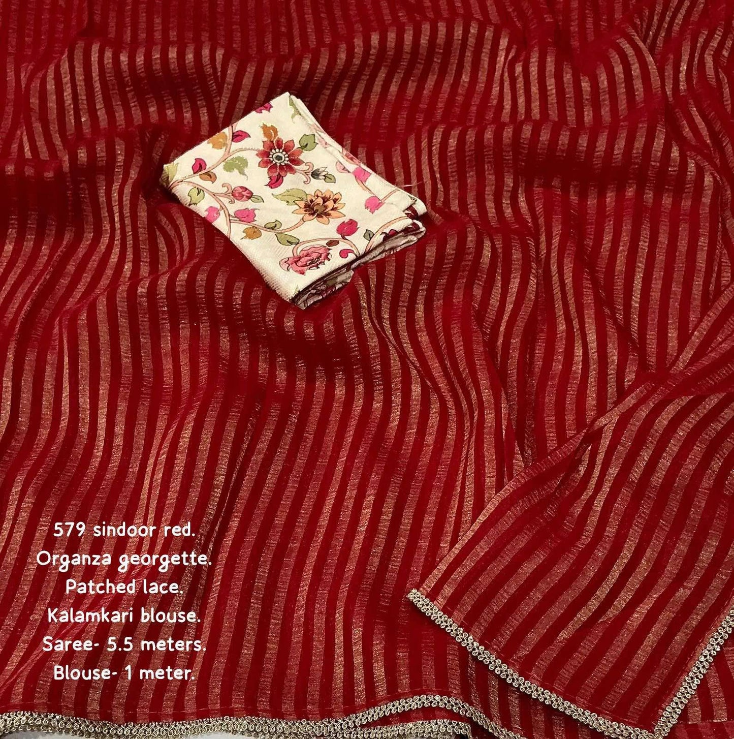 VERMILLION RED Soft Georgette Organza Saree with zari stripe style leheriya zari woven design with Patched lace Border....

Perfectly matched crape silk kalamkari foil
Blouse