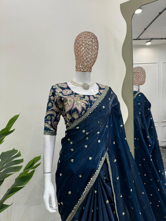 Jimi Chu Organza Saree with heavy lace work & all over sequence work paired with heavy embroidered work blouse piece