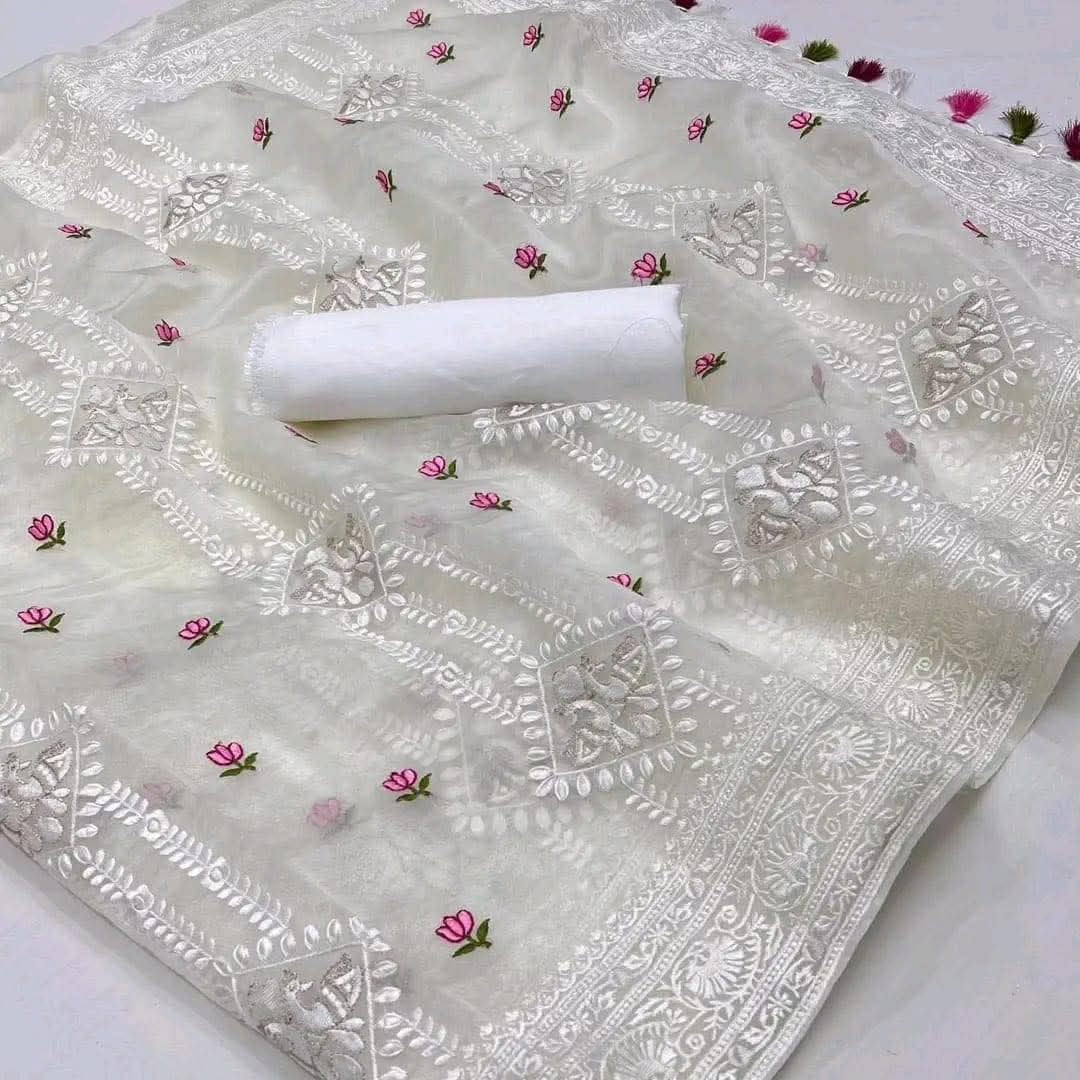 Organza saree with all over embroidery work & with colorful tassels on the pallu