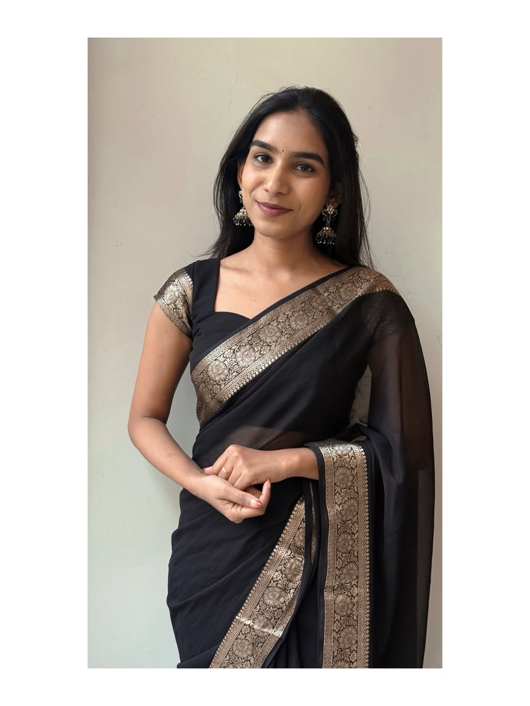 Bold Black Elegance Chiffon Saree— sheer grace with a rich golden border, timeless and powerful